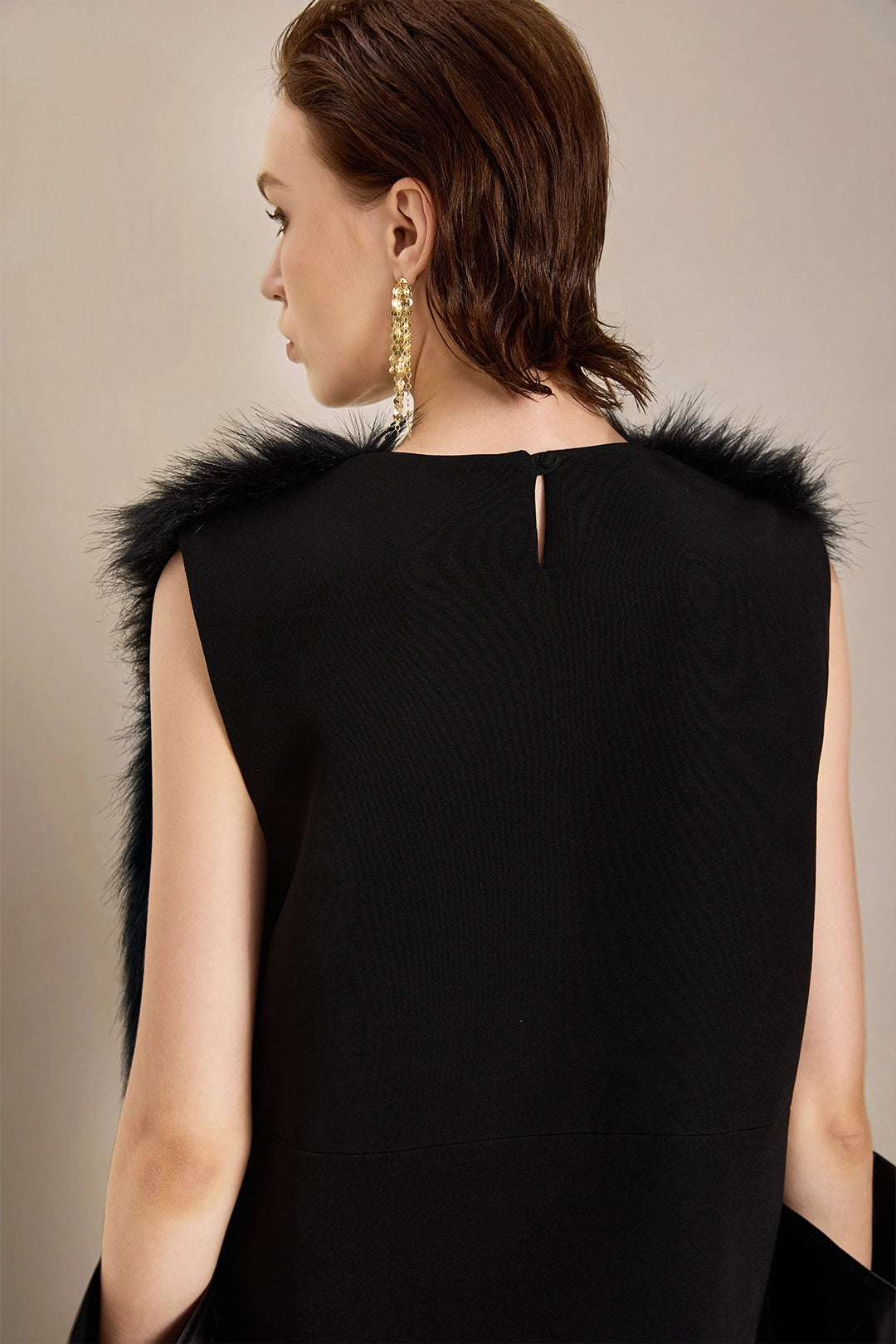 Back view of Solelegia Women's Long Hair Faux Fur Vest, soft and warm winter layering