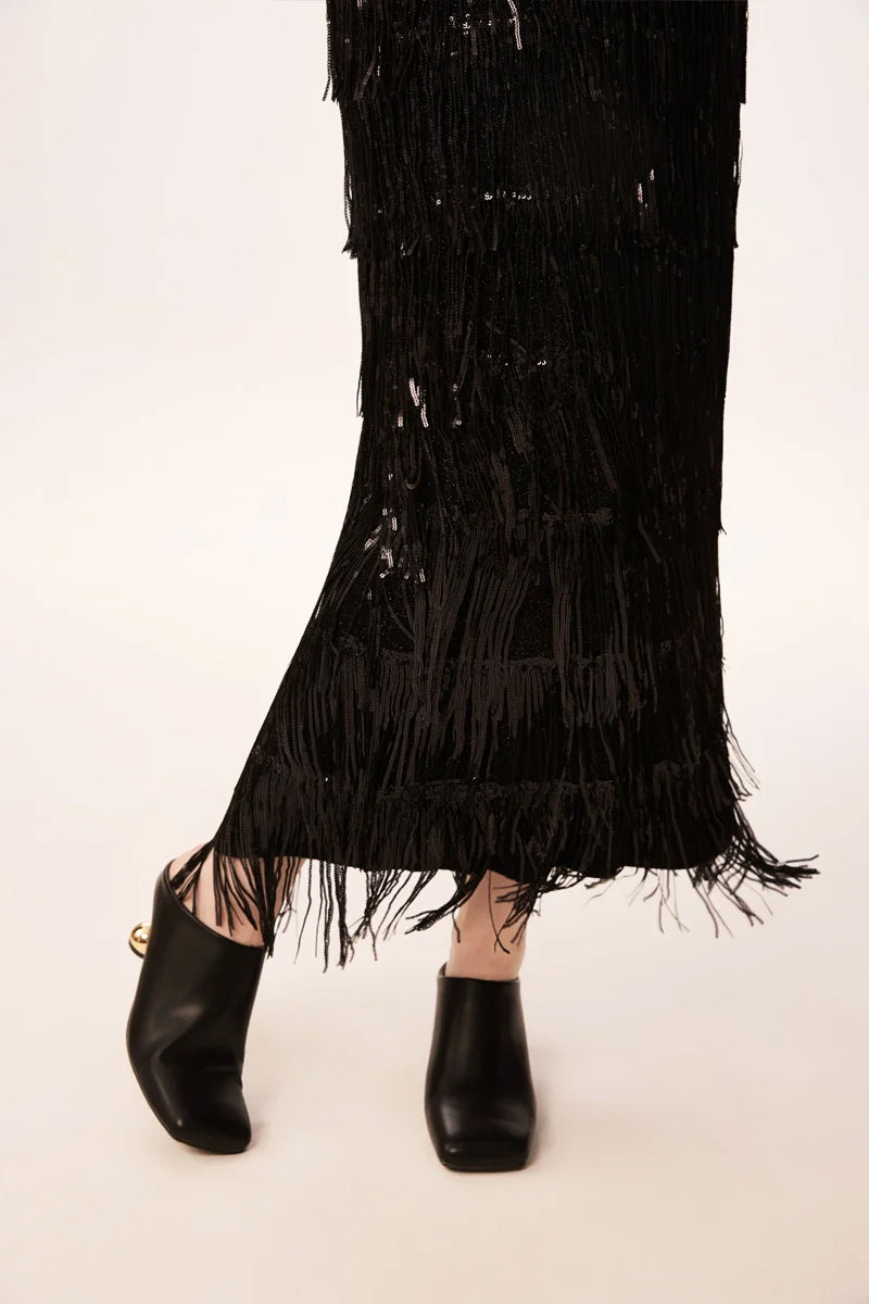 Close-up of black sequin fringe midi skirt