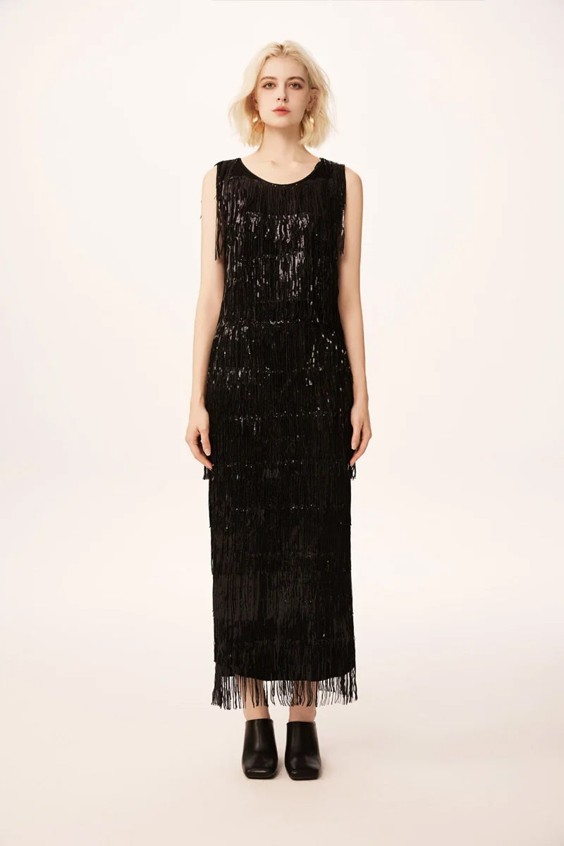 Model wearing black sequin fringe midi skirt