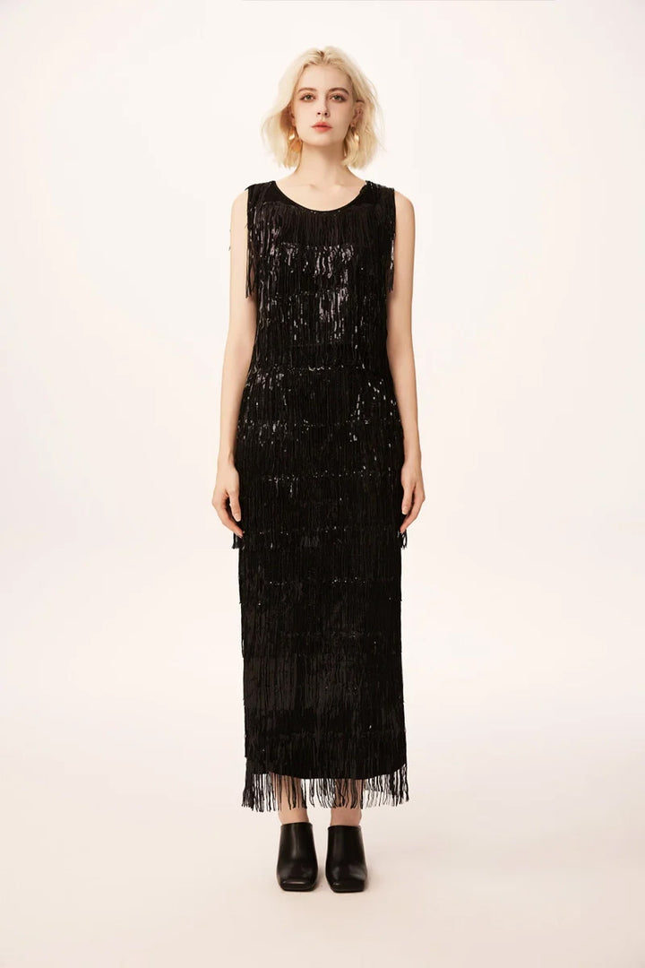 Model wearing black sequin fringe midi skirt