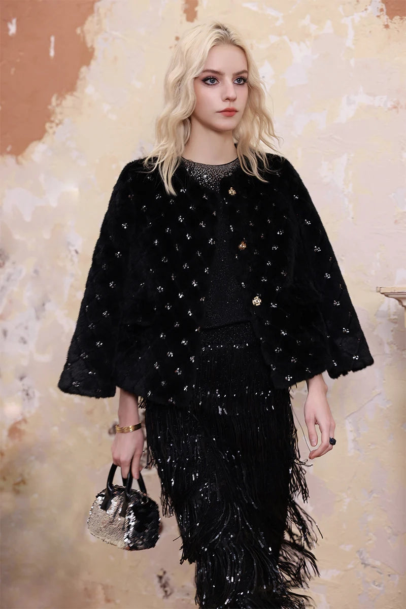 Model wearing embellished wool coat, elegant women’s outerwear for winter and evening occasions