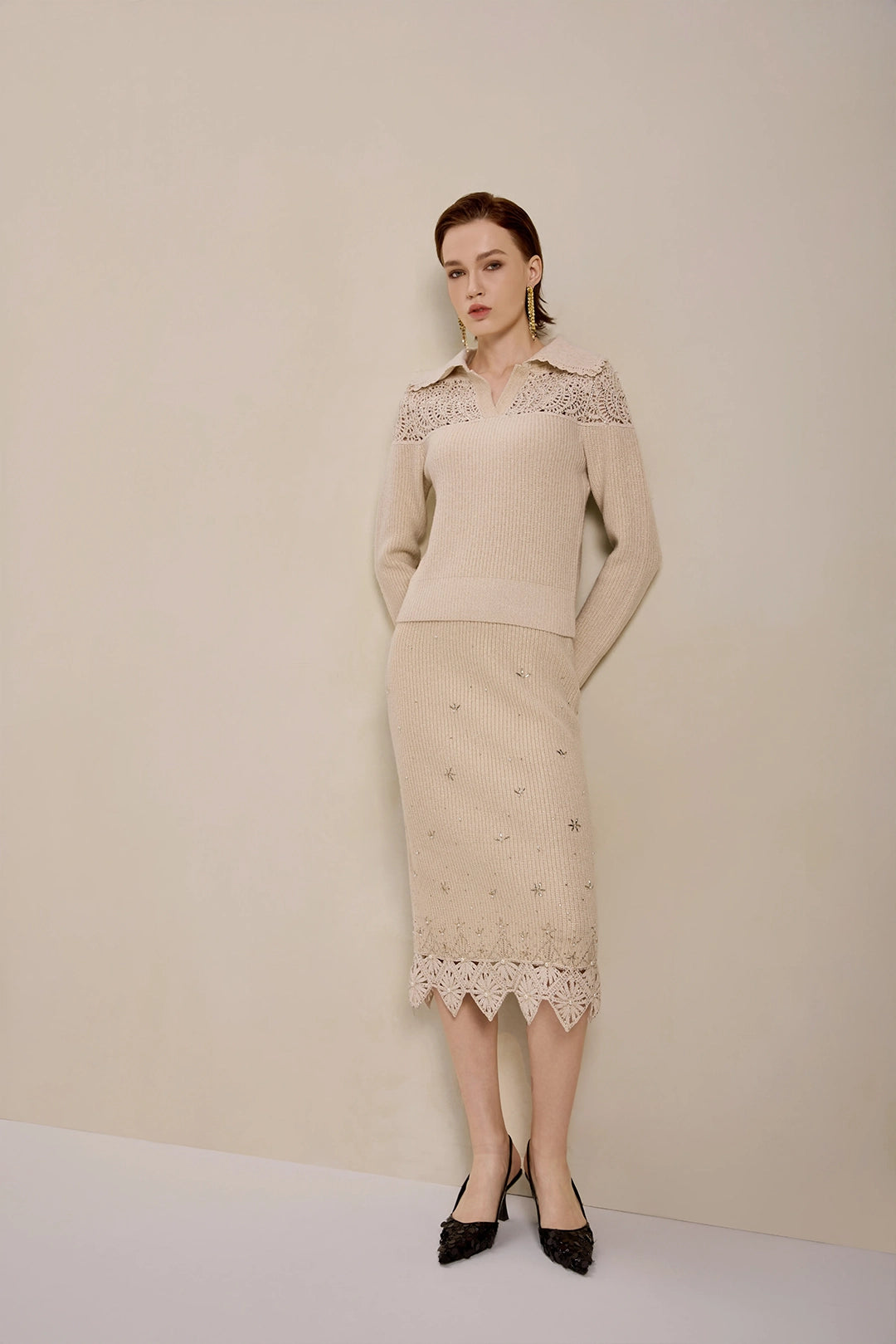 Solelegia Beige Wool Knit Crop Sweater Model Wearing for Date Night