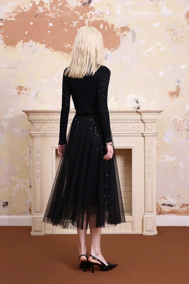 Solelegia black glitter gauze A-line skirt back view, stylish women’s midi skirt for party and evening outfit