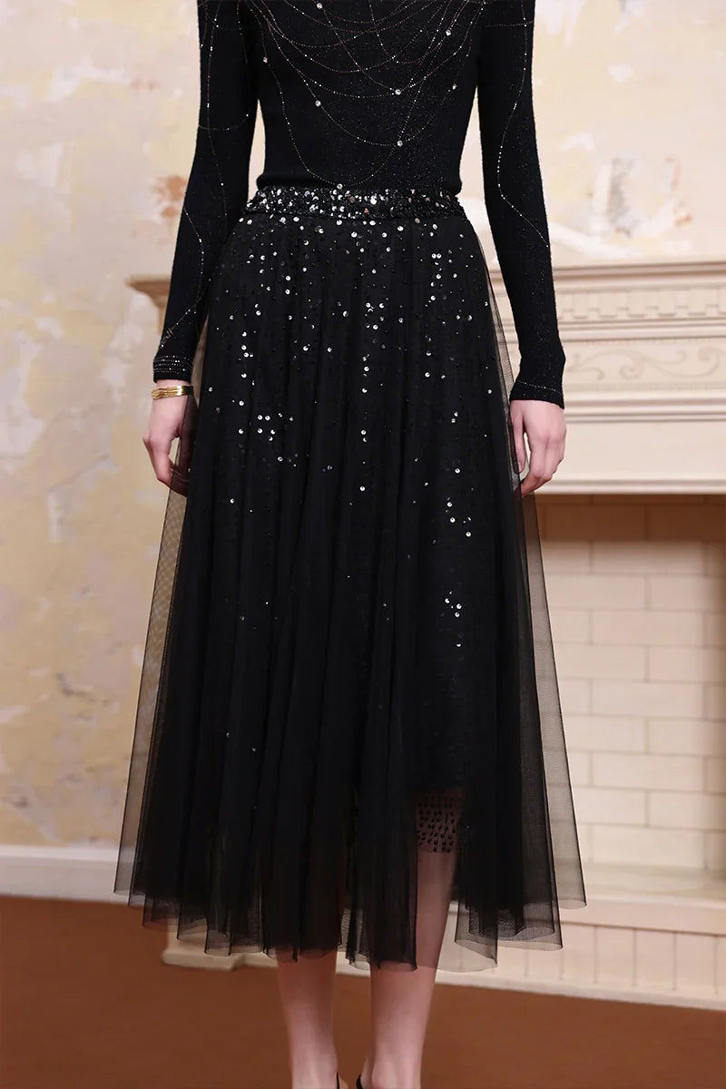 Close-up of Solelegia black glitter gauze A-line skirt, sparkling fabric detail for elegant evening occasions