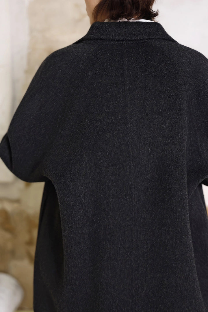 Back view of Solelegia Classic Double-Breasted Mid-Length Camel Wool Coat