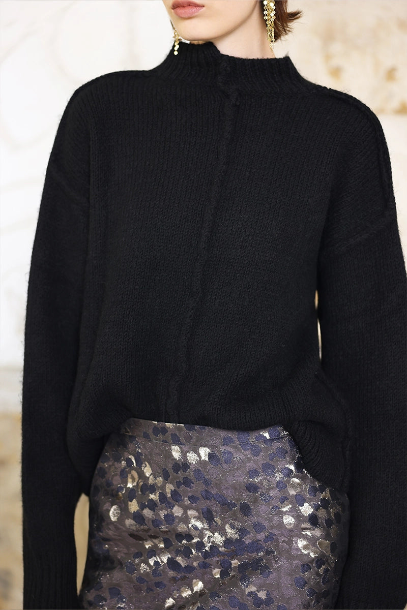 Detail view of Solelegia Round Neck Long Sleeve Knit Top