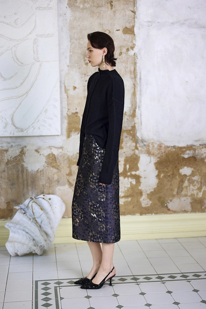 Side view of Solelegia Round Neck Long Sleeve Knit Top