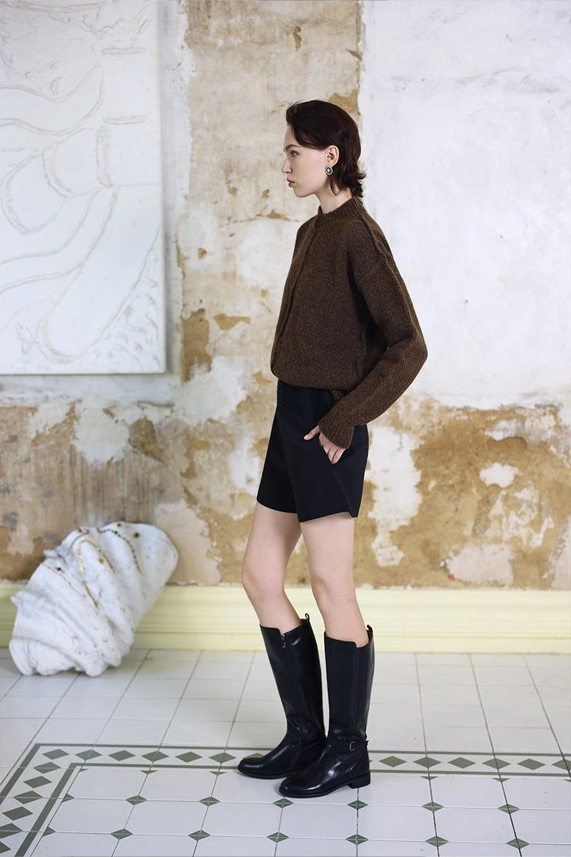 Side view of Solelegia Round Neck Long Sleeve Knit Top