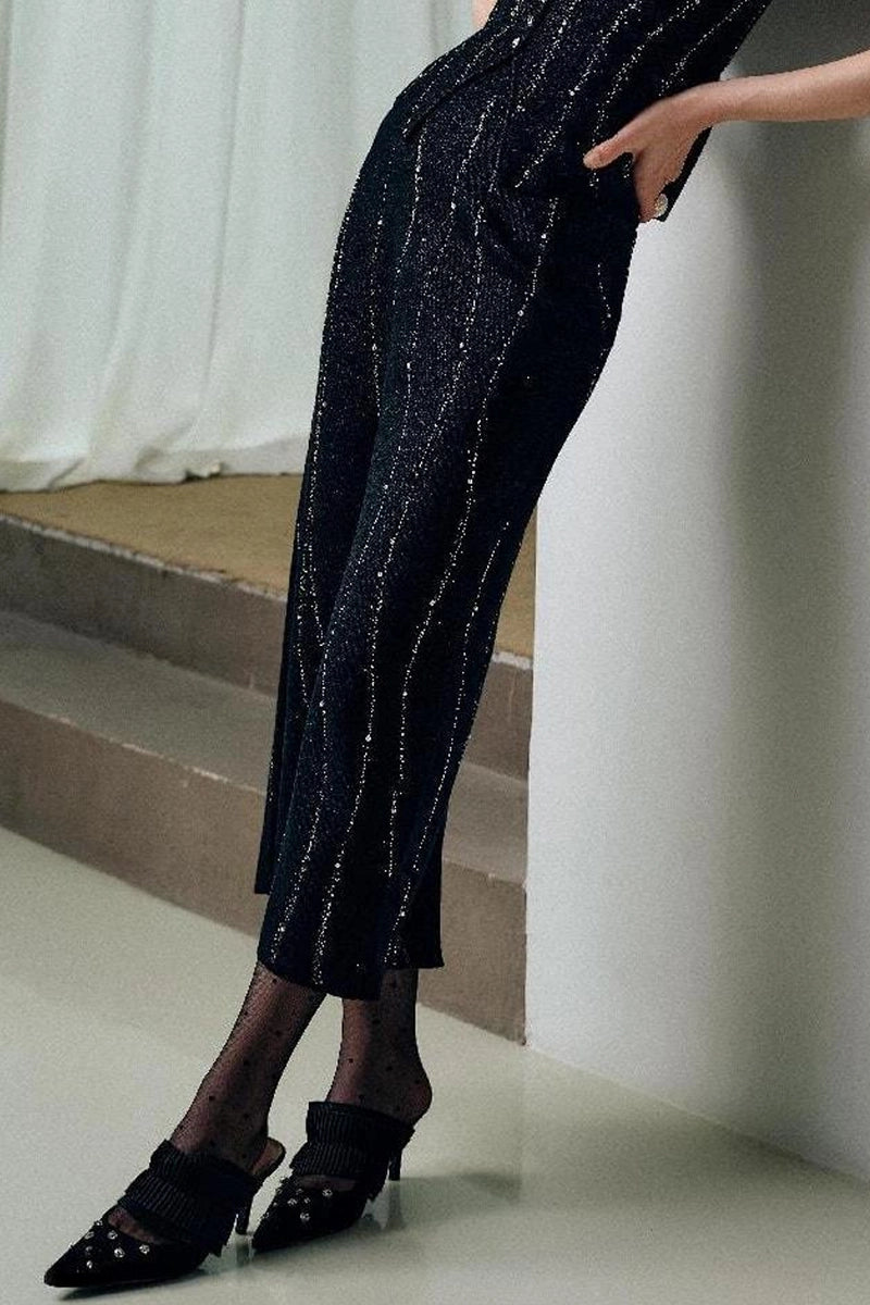 Front view of Solelegia Silver Thread Knit Flowing Water Skirt with pearls and crystals