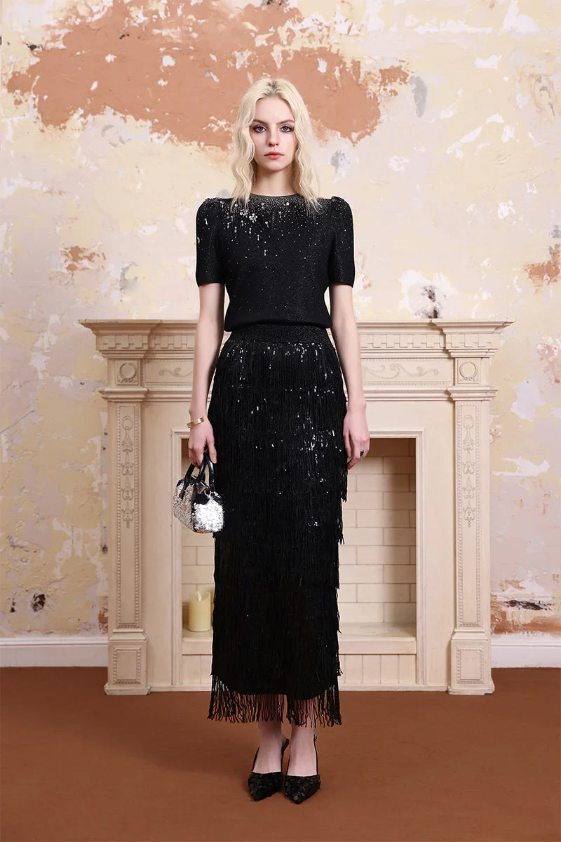 Model wearing Solelegia sparkling embellished wool top, luxury merino knit outfit with rhinestone embellishment
