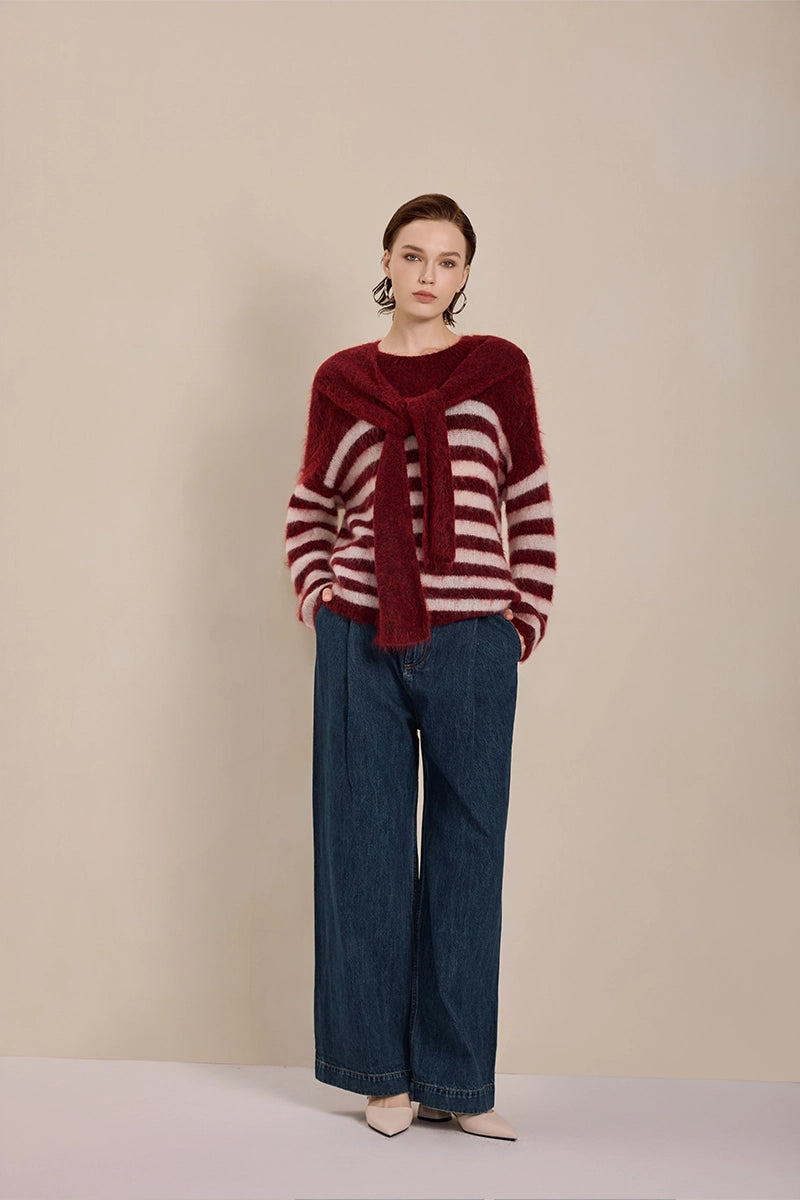 Model demonstrating multiple styling options with Solelegia Versatile Knit Sweater