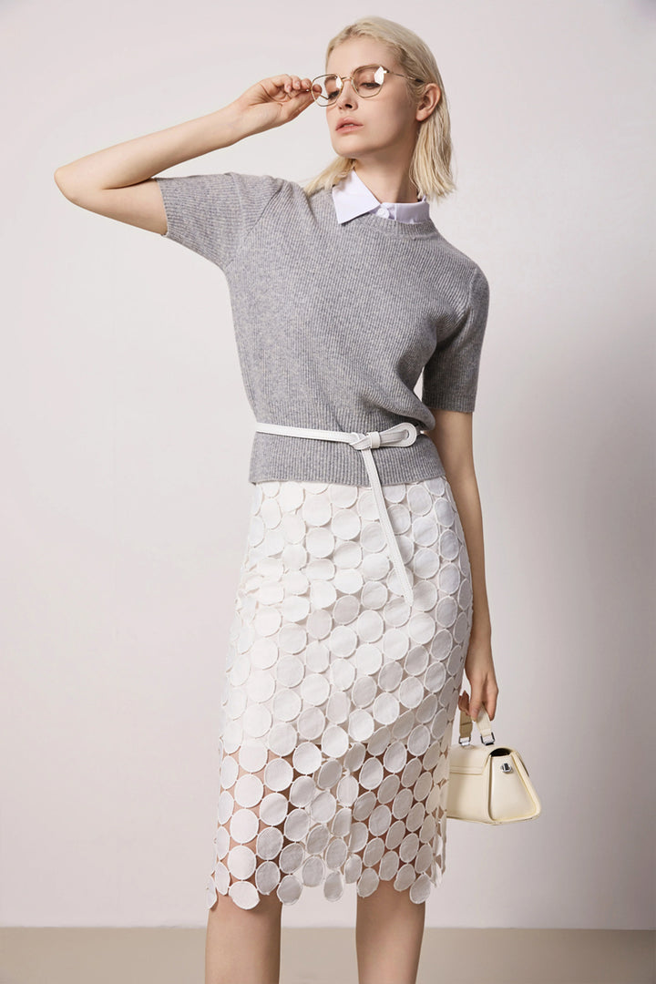 Model wearing Solelegia white hollow-out slim straight skirt