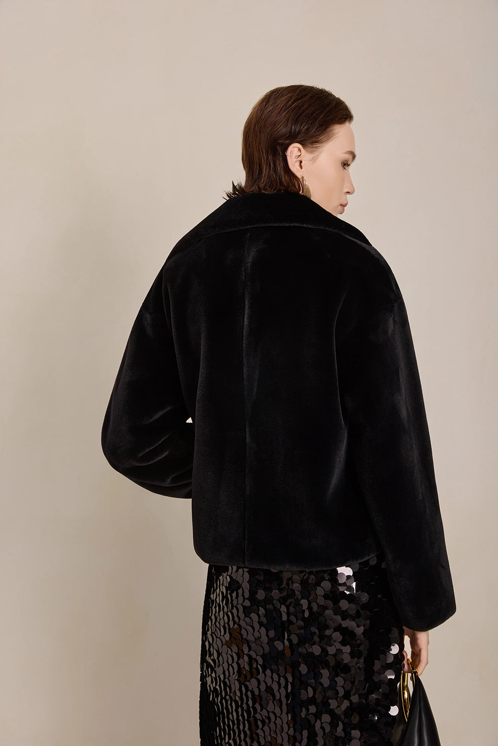 Back view of Solelegia Women's Elegant Faux Fur Coat