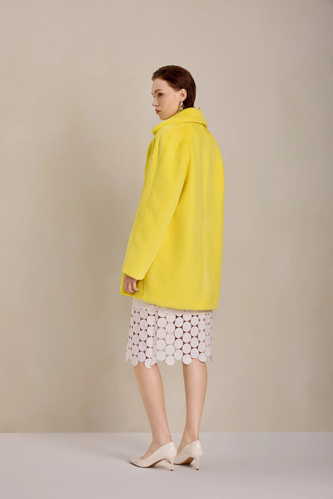 Back view of Solelegia Women's Elegant Faux Fur Coat