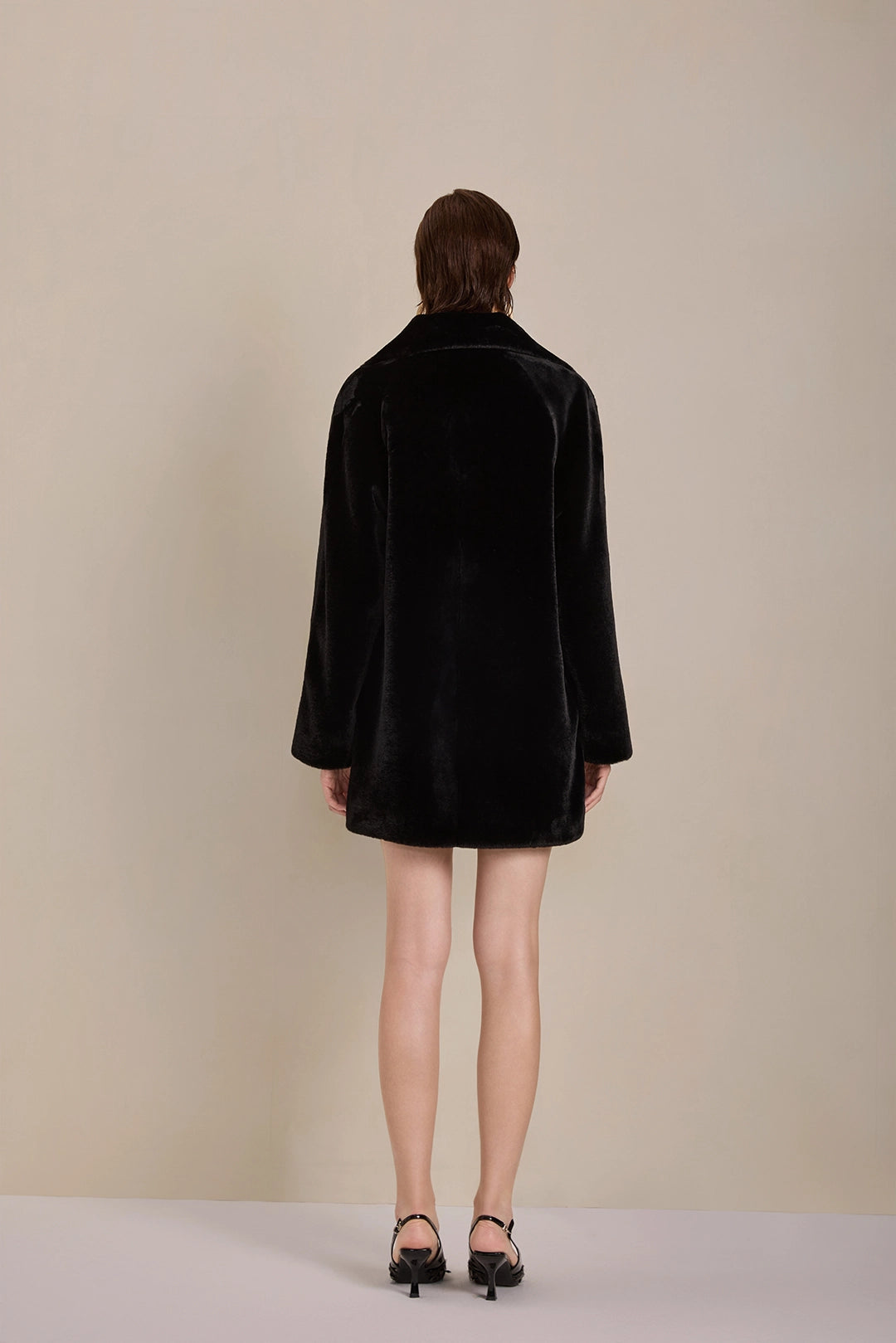 Back view of Solelegia Women's Elegant Faux Fur Coat