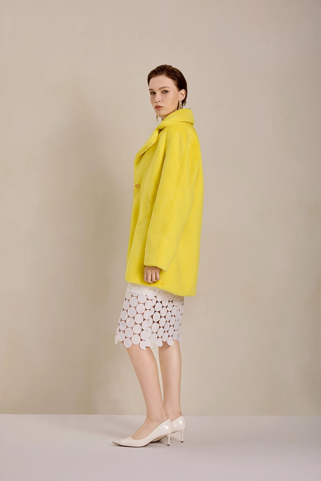 Side view of Solelegia Women's Elegant Faux Fur Coat